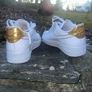 Nike White Sneakers with Gold and Silver Accents